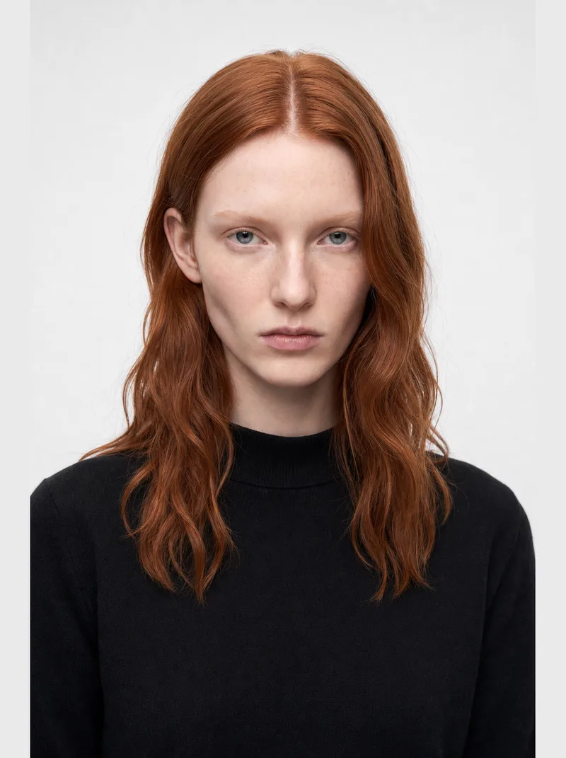 Ida — AI fashion model with long copper-red hair